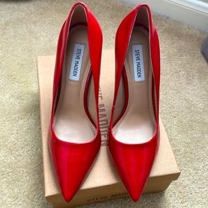 Red patent Steve Madden VALA pumps.